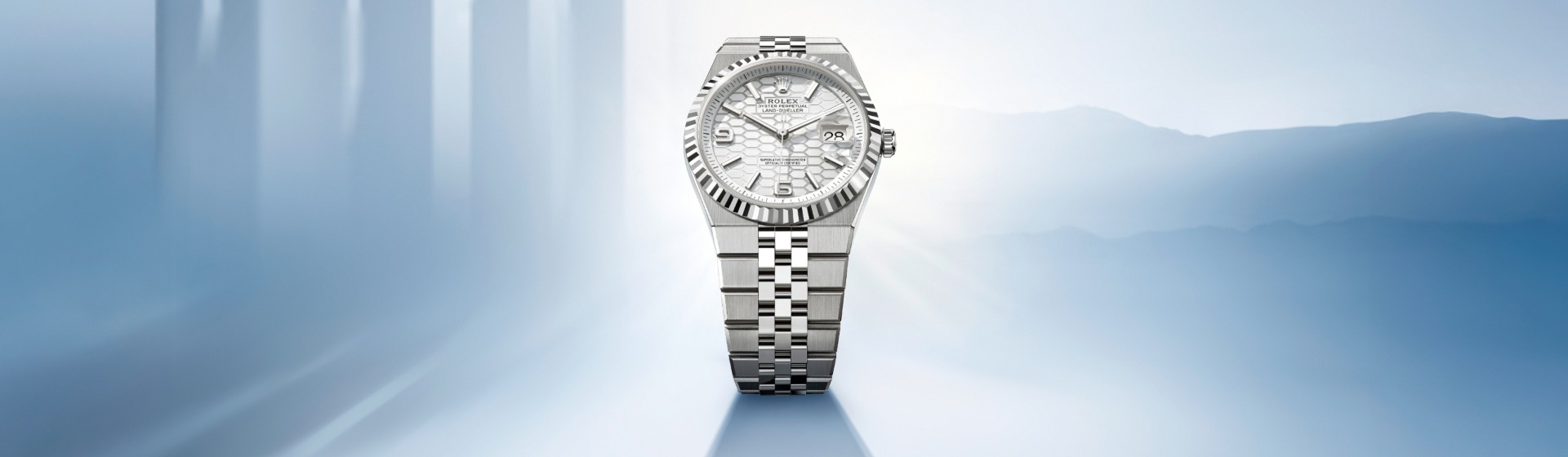 rolex Land-Dweller em Rolesor branco – combinação de aço Oystersteel e ouro branco, M127334-0001 - Costantini Joias